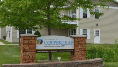 Fresh air and lush greenery surround Vista Prairie at Windmi in Alexandria, MN, offering a welcoming environment for seniors to enjoy active and peaceful living with beautiful community views.