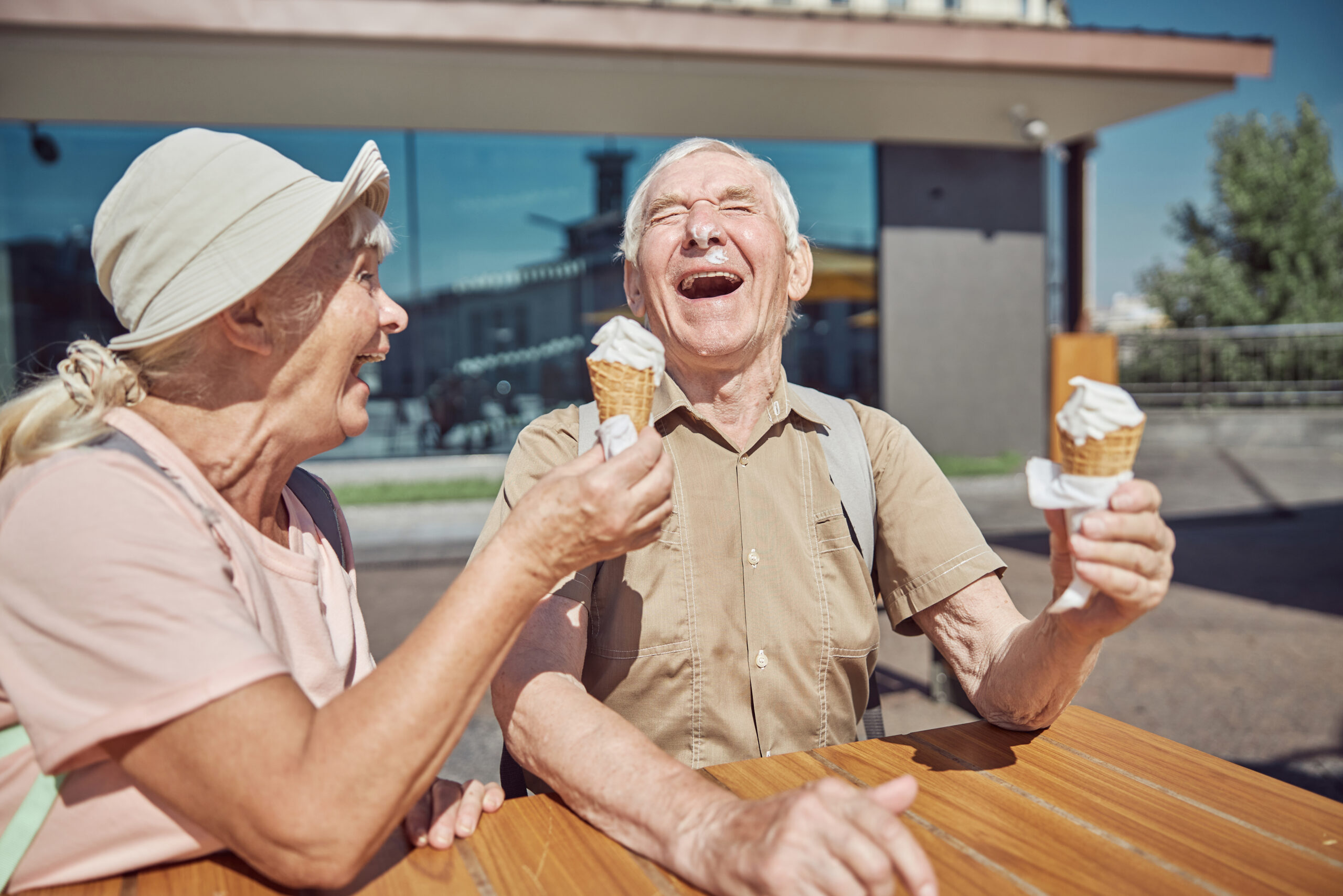picture of an older man and woman enjoying ice cream cones