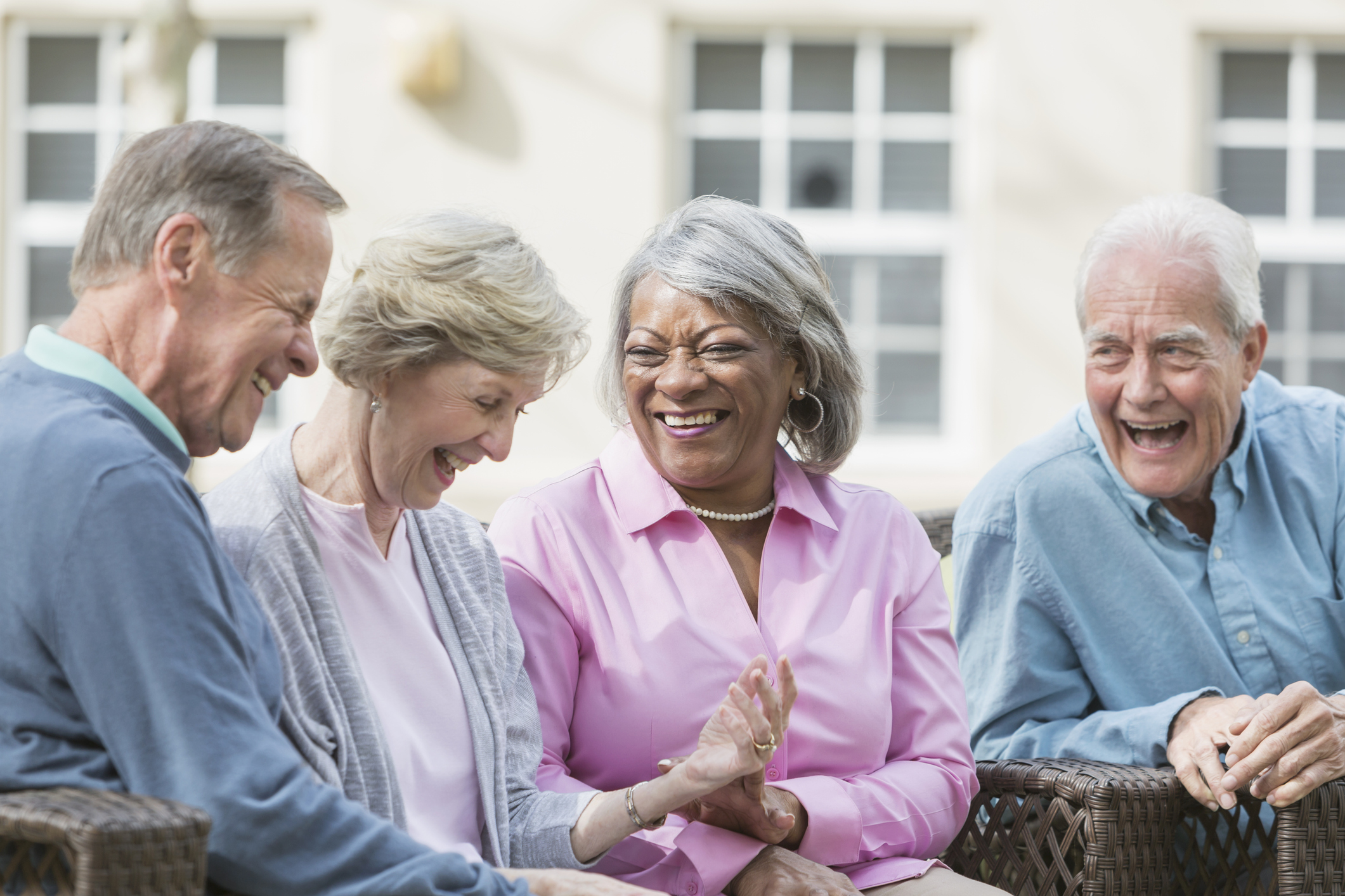 group of seniors outside laughing