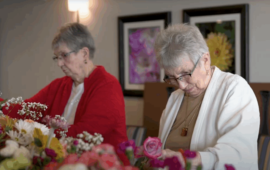 Colorful floral arrangements at Vista Prairie at Copperleaf senior living facility in Willmar, MN, showcase vibrant flowers and a peaceful environment for residents.